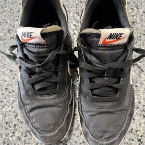 Nike women’s Black and White Sneakers